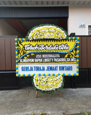 Papan Bunga Duka di Medan Barat